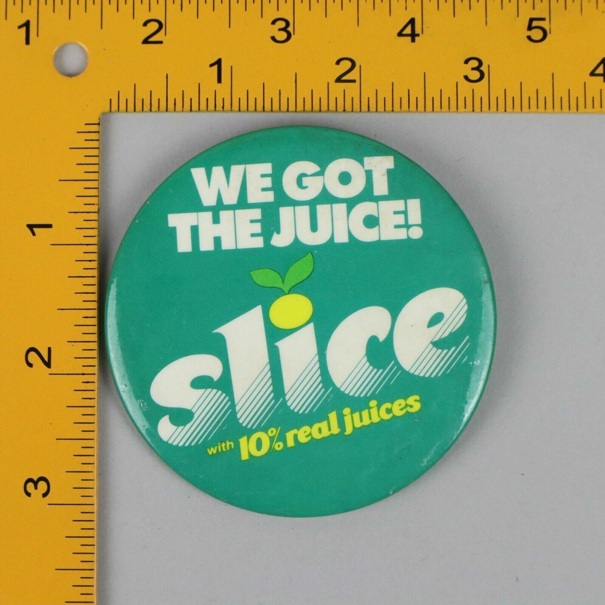 Vintage Button Pinback Slice, “We got the Juice” 3” (Advertisement)