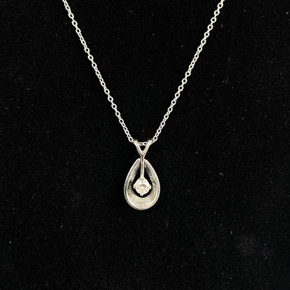 Diamond Pendant in a Teardrop Setting (Estate) Read