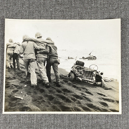 Official U. S. Marine Corps Photo Wounded Marines are helped Iwo Jima WWII