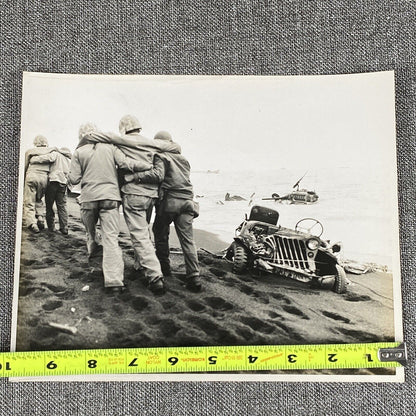 Official U. S. Marine Corps Photo Wounded Marines are helped Iwo Jima WWII