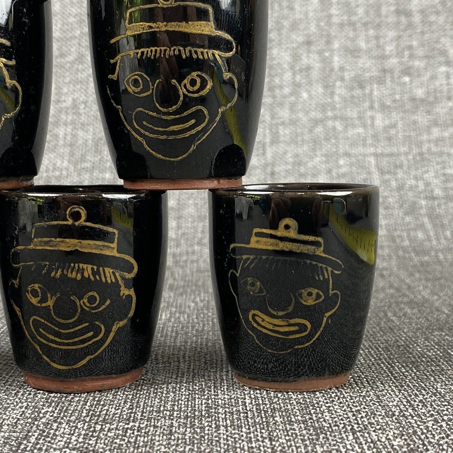 Vintage  Set Of 6 Shot clay cups with faces, made in Japan