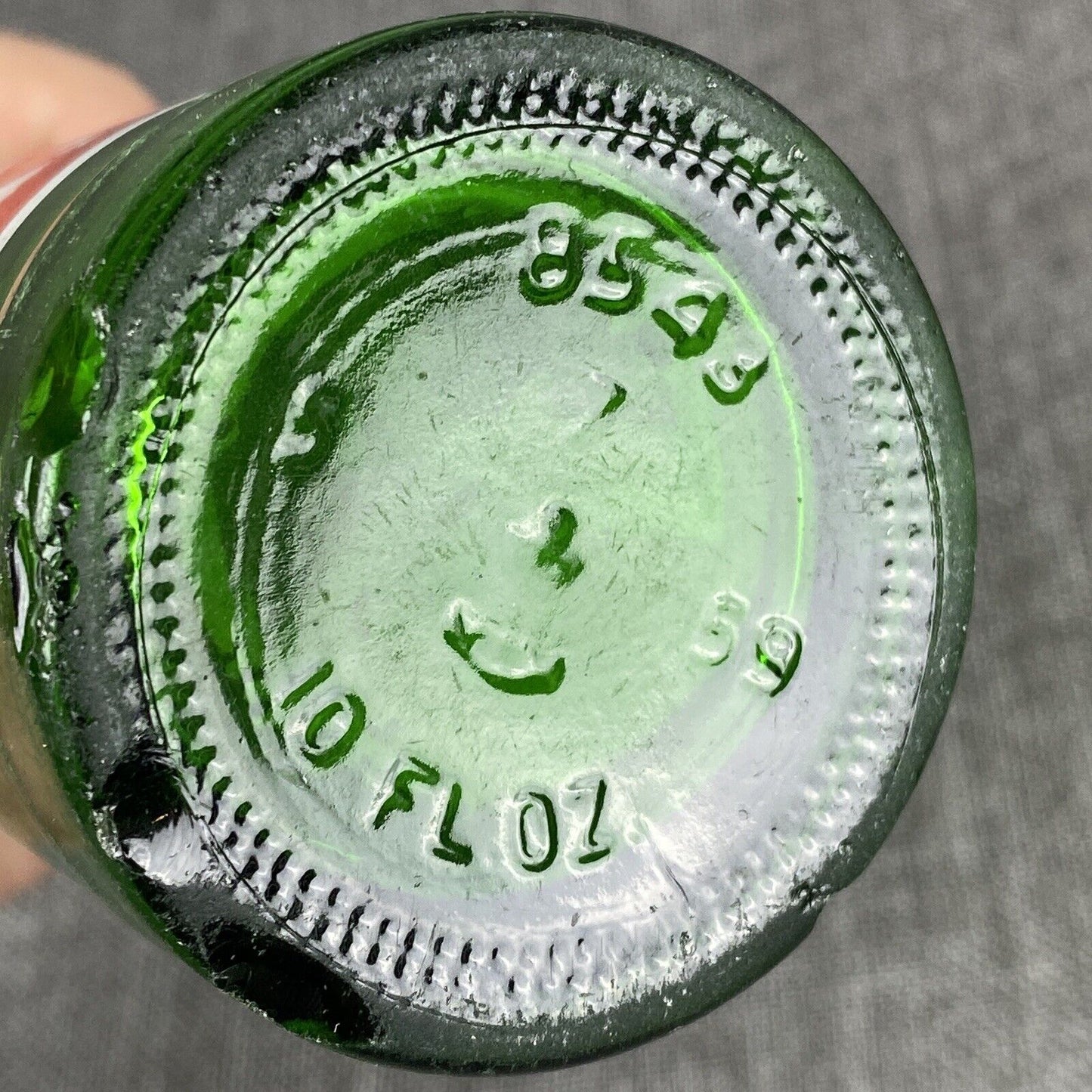 Vintage Mountain Dew 10 oz. Bottle by Harold and John Bottle- Has Flea Bite