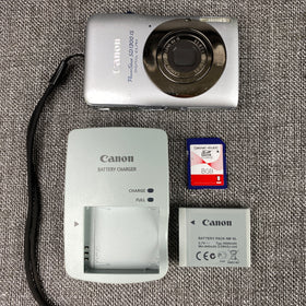 Canon PowerShot SD1300 IS 12.1 MP Digital  Camera silver SD Card, Battery TESTED