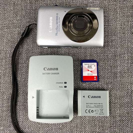 Canon PowerShot SD1300 IS 12.1 MP Digital  Camera silver SD Card, Battery TESTED