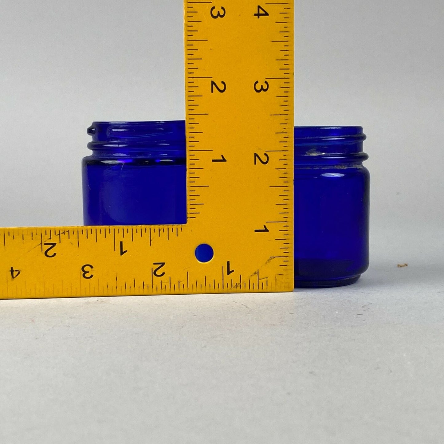 2 Cobalt Blue Glass Medicine Bottles (Vicks / Mezon)