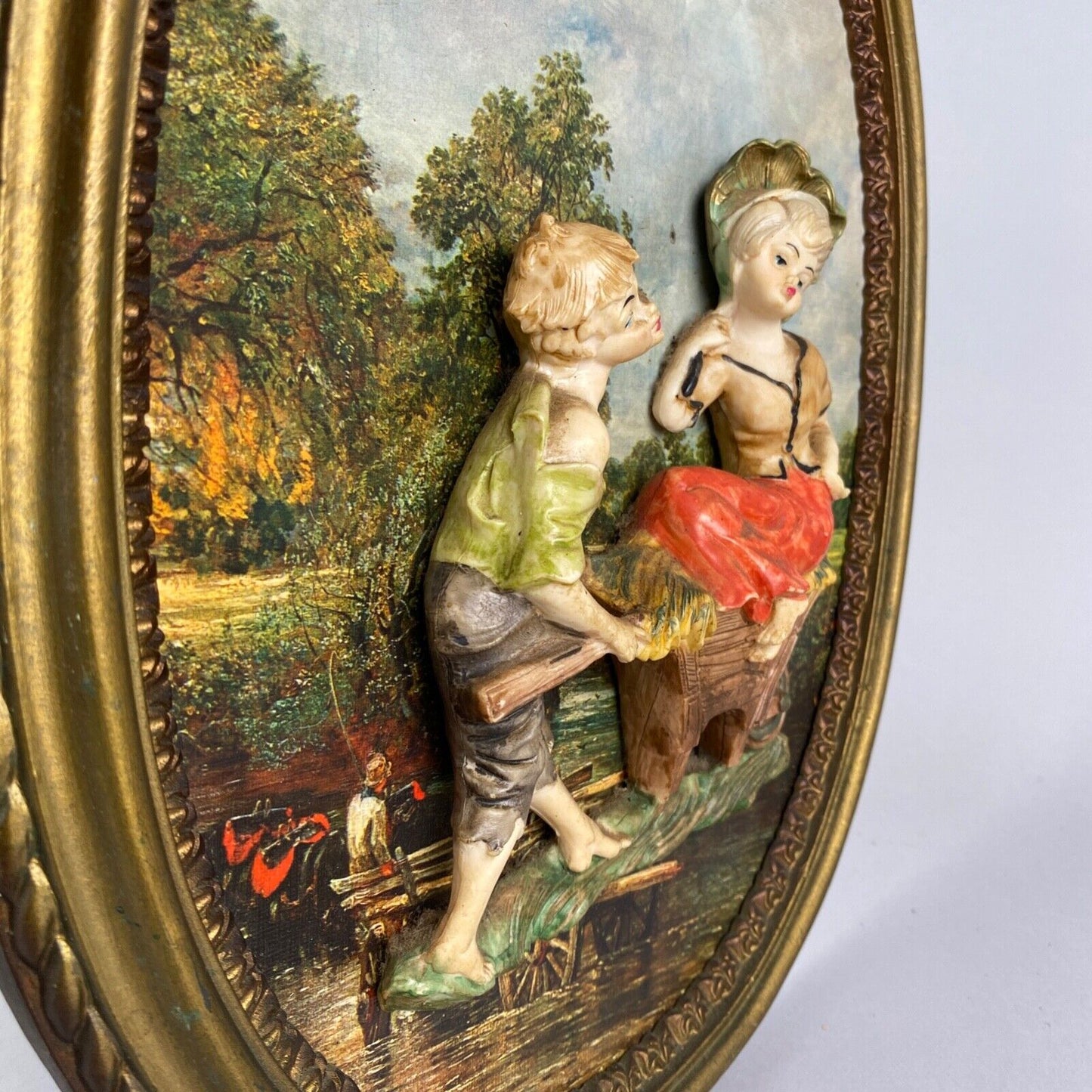 Pair of Boy and Girl Depose Italy 3D Figures Situated in an Oval Frames 16"x12"