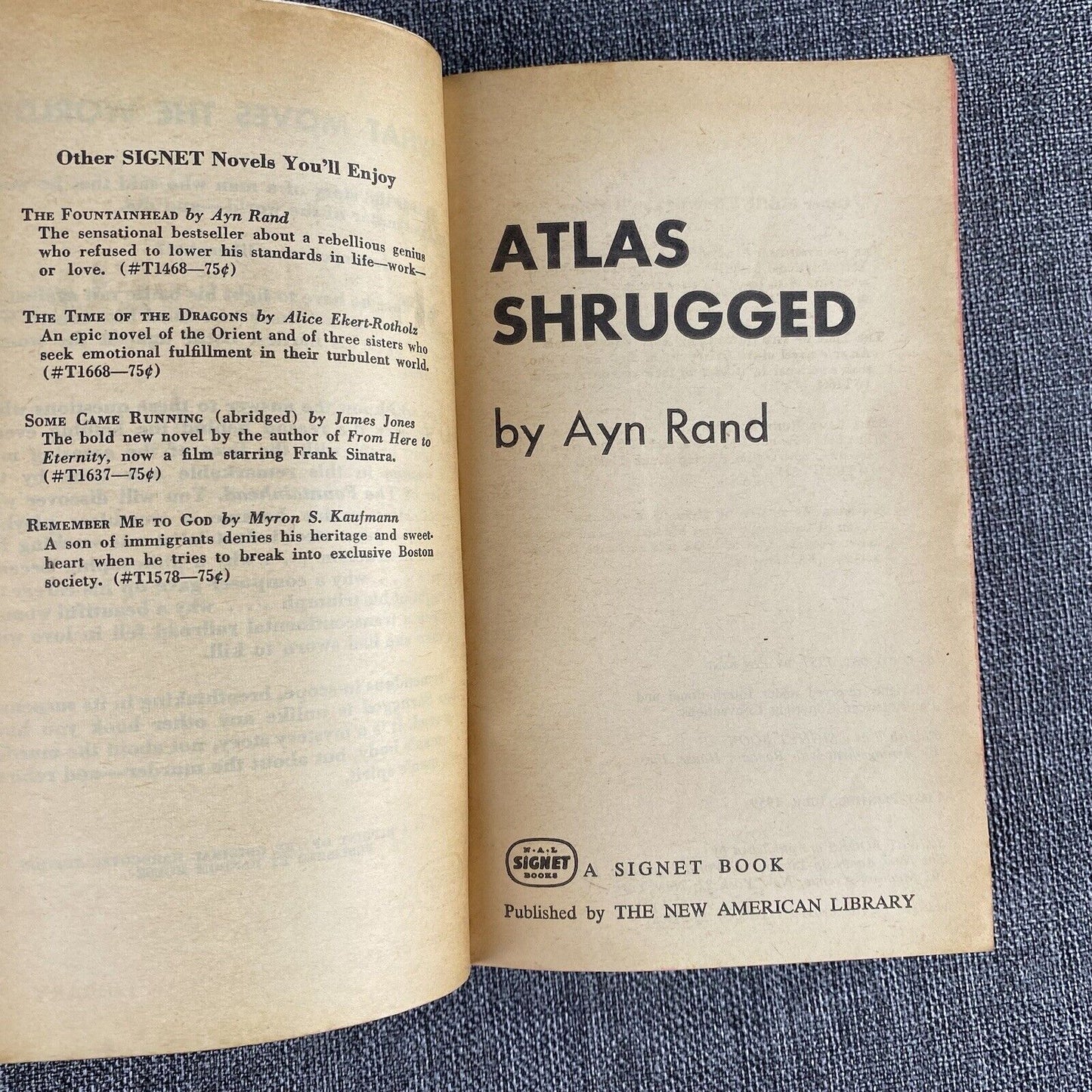 Atlas Shrugged by Ayn Rand, first paperback printing 1959. Signet Q1702