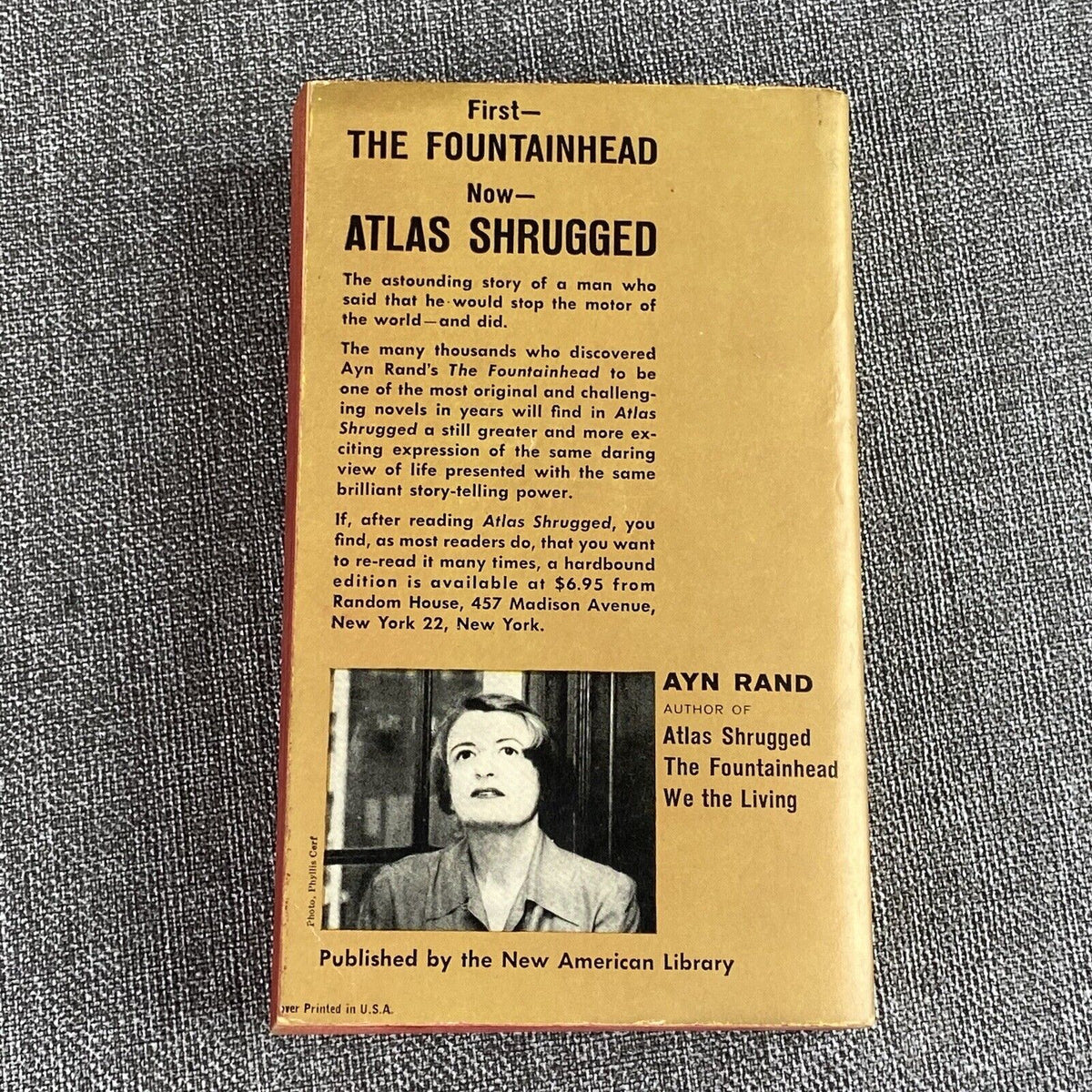 Atlas Shrugged by Ayn Rand, first paperback printing 1959. Signet Q1702