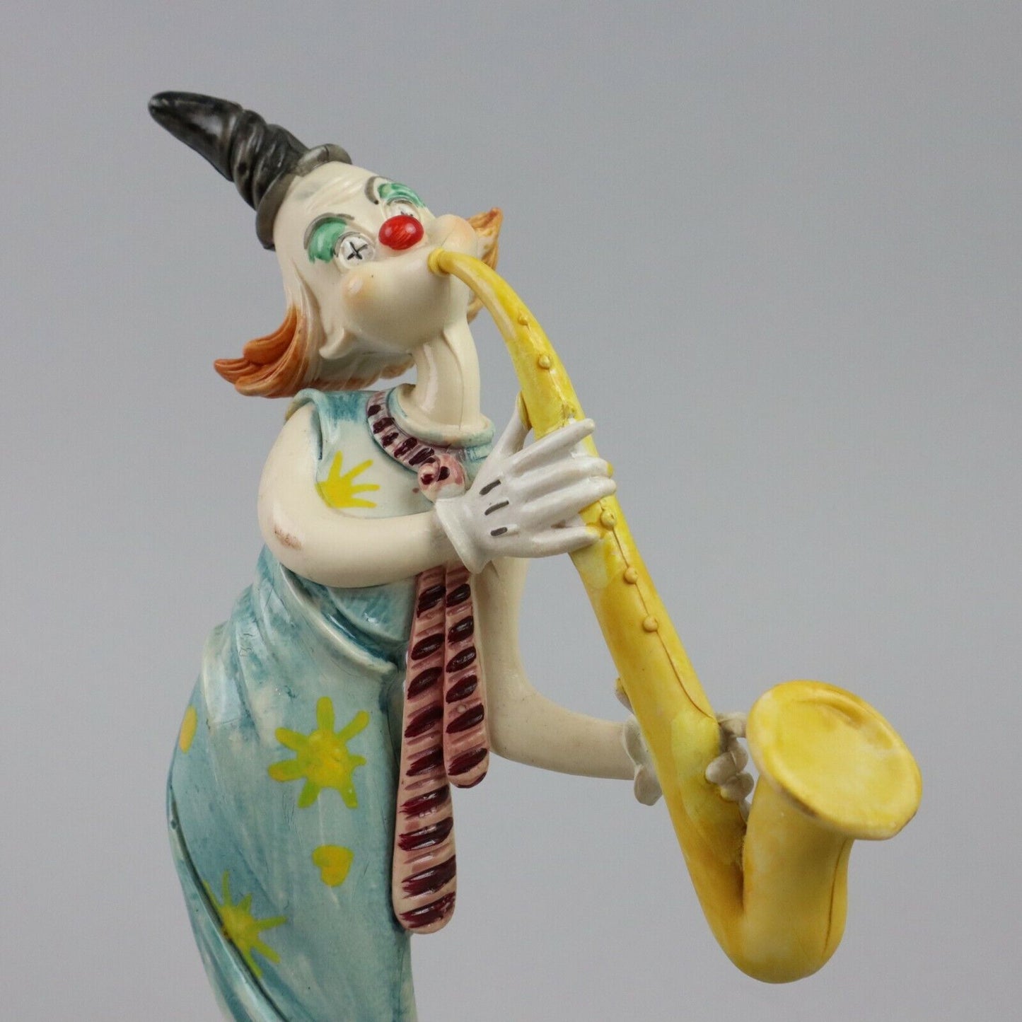 Clown Playing Saxophone Figurine on Marble Base